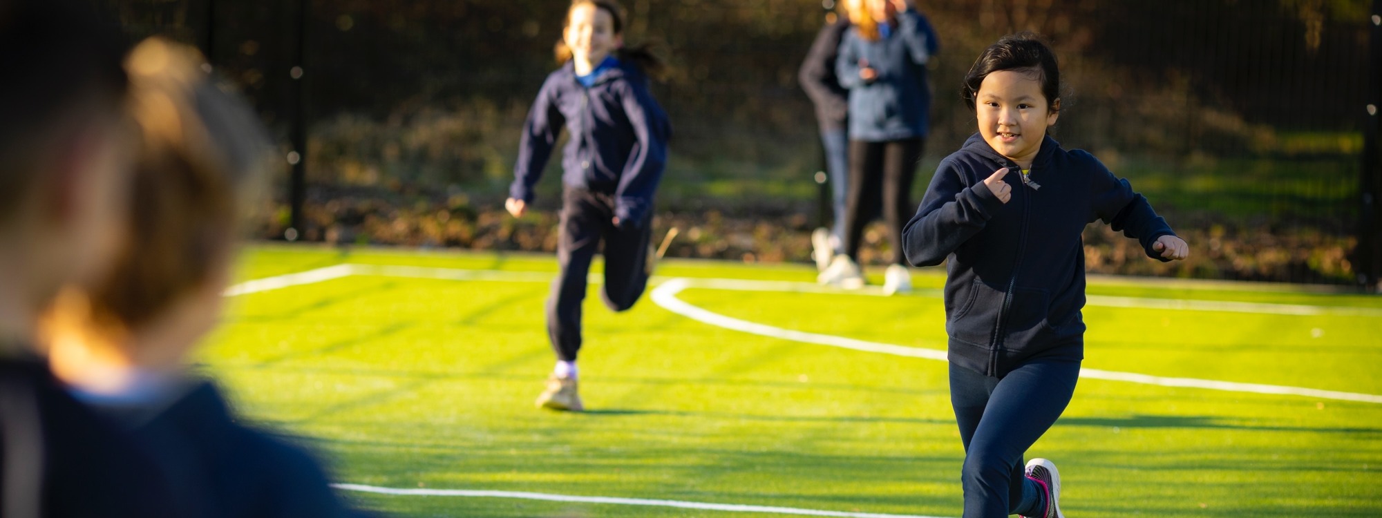 Lickey Hills School pupils outside doing running or pe